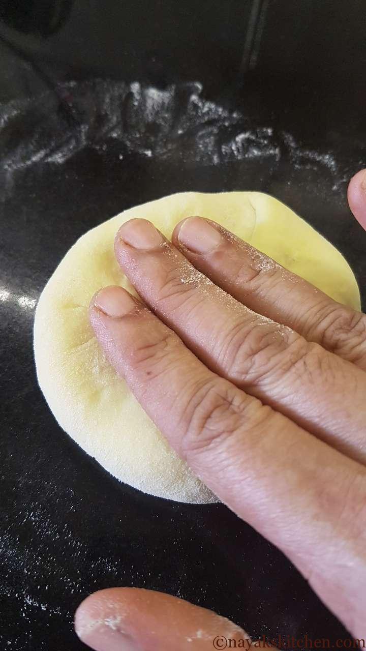 Rolling the puran poli