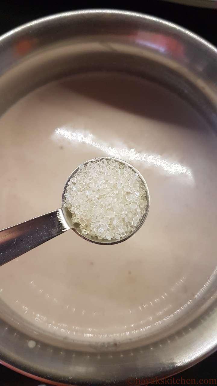 Adding sugar to solkadhi
