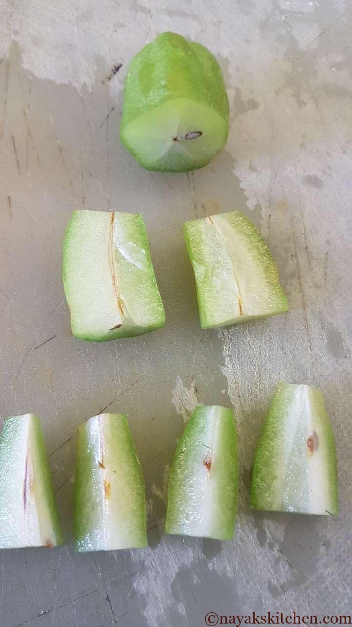 Cutting bilimbi into quarters