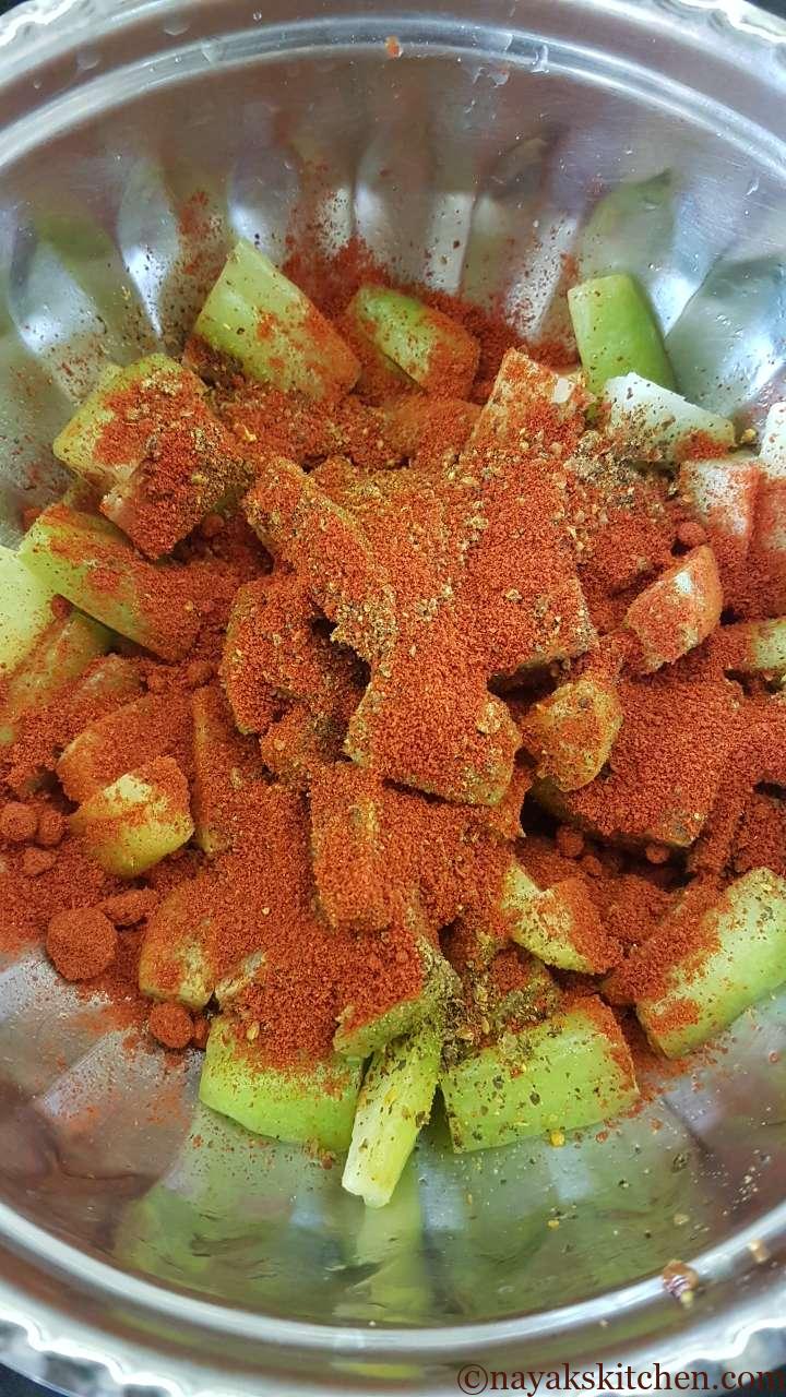 Adding red chilli powder