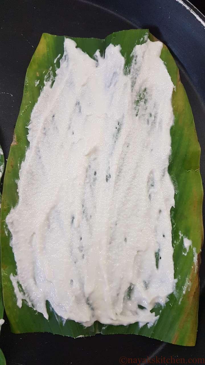 Applying rice paste to turmeric leaf