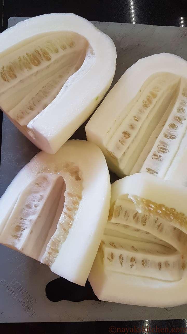 Cutting cucumber into quarters