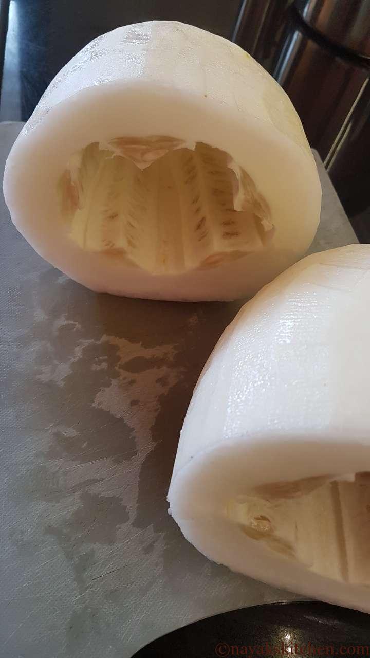 Cutting cucumber into halves