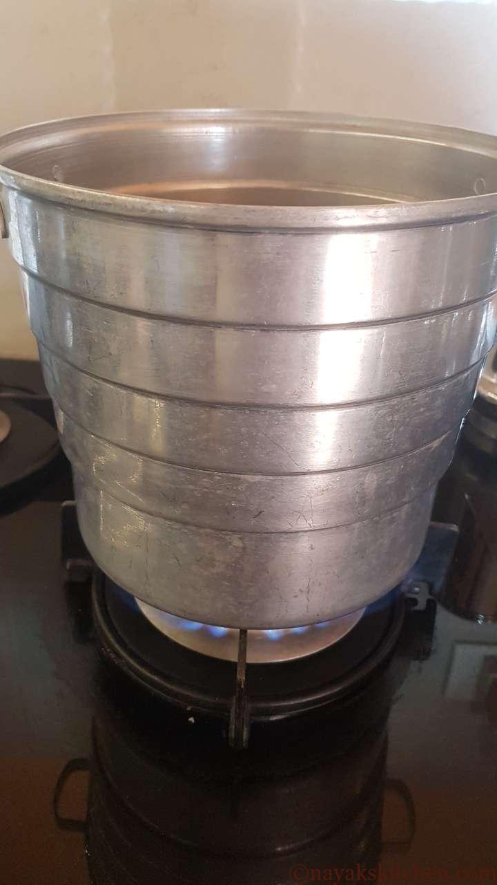 Heating water in a idli steamer