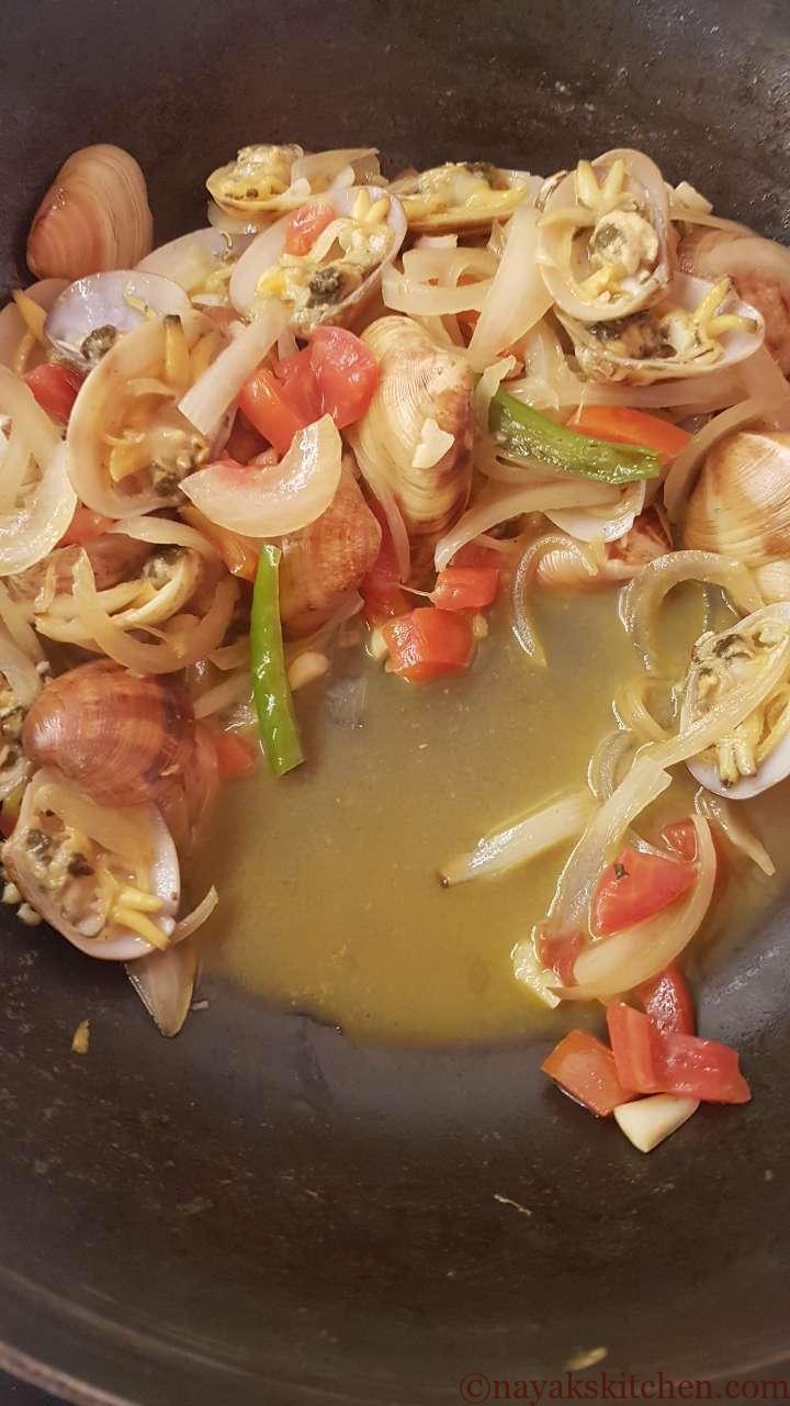Water released while cooking clams masala