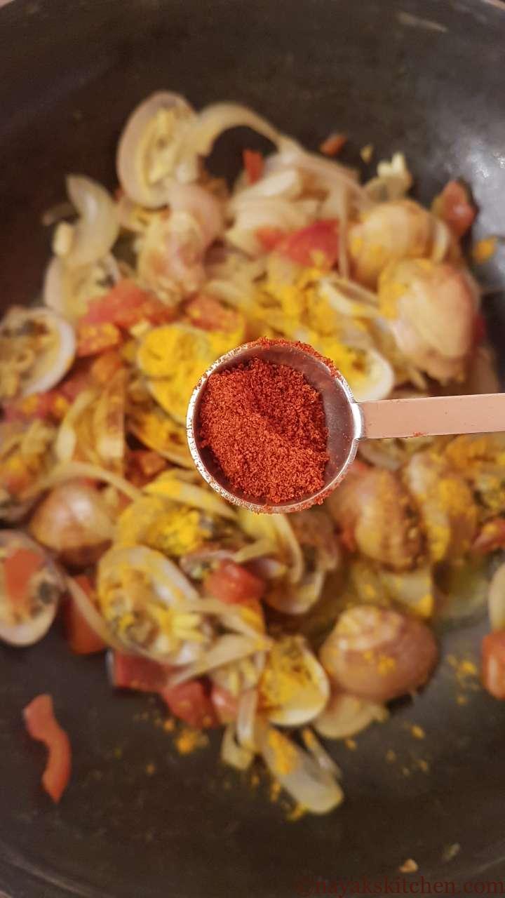 Adding chilli powder