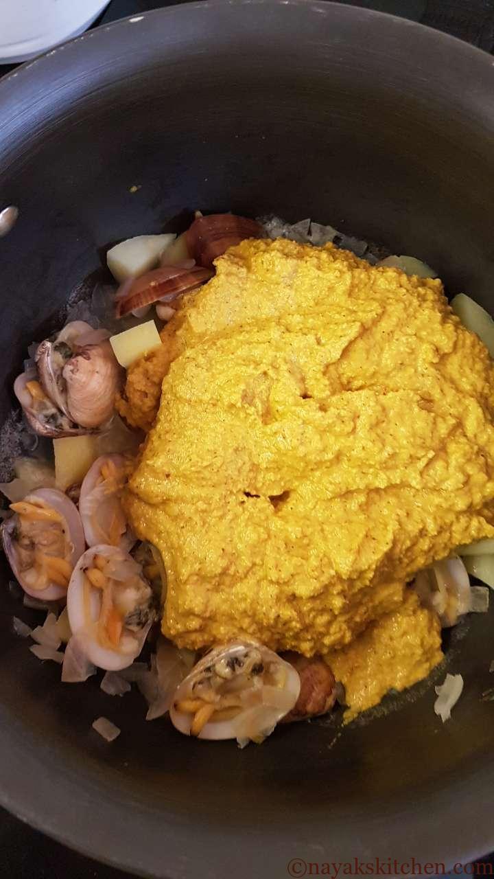 Adding ground masala to tisrya masala