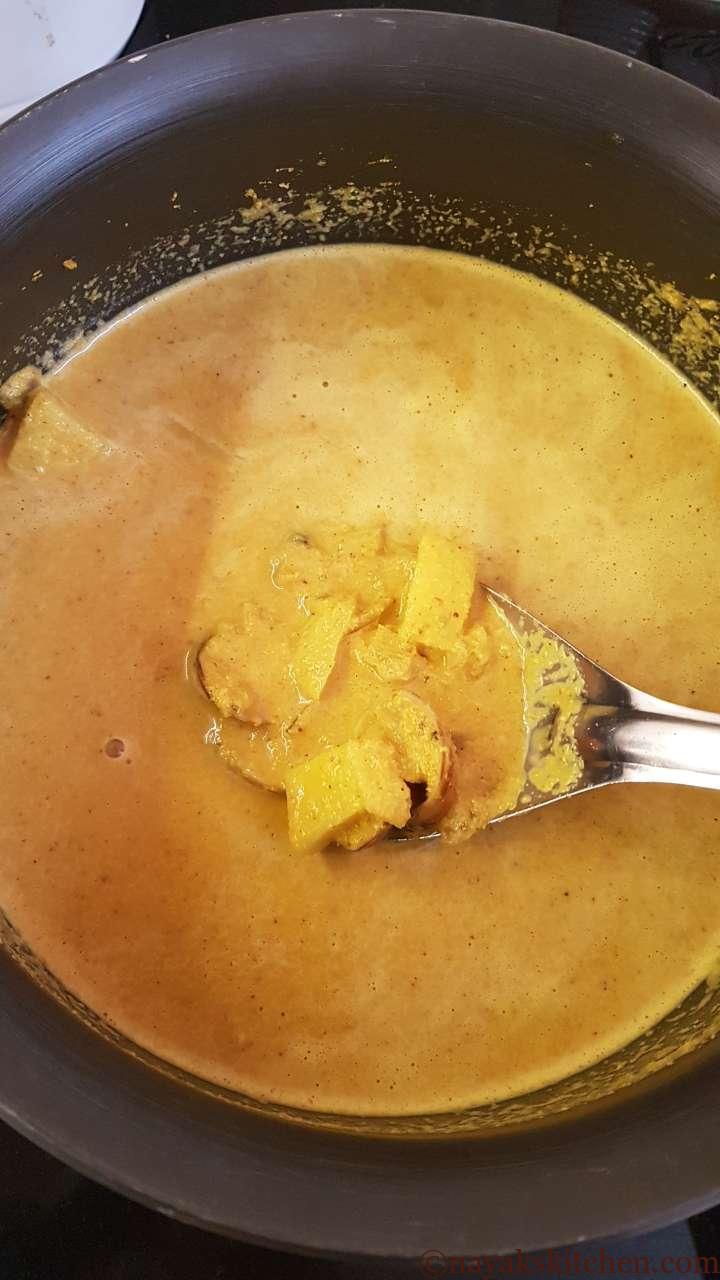 Stirring clams masala.