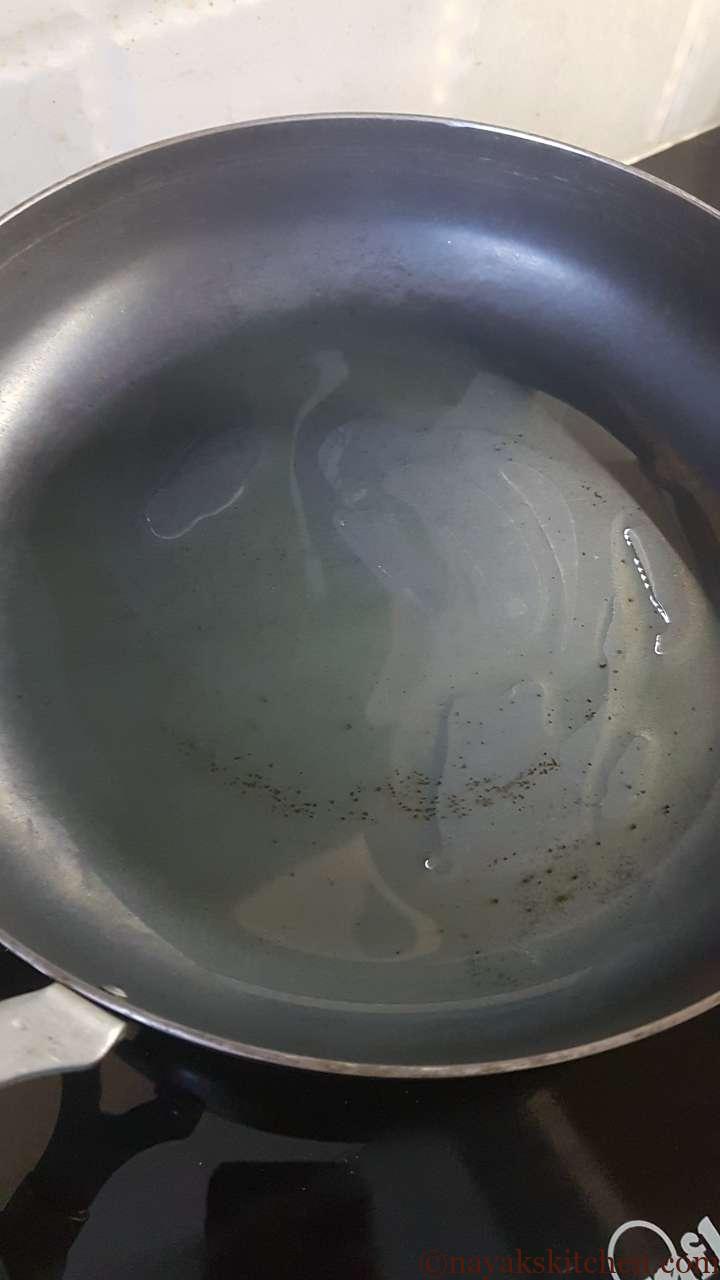 Adding oil to a pan