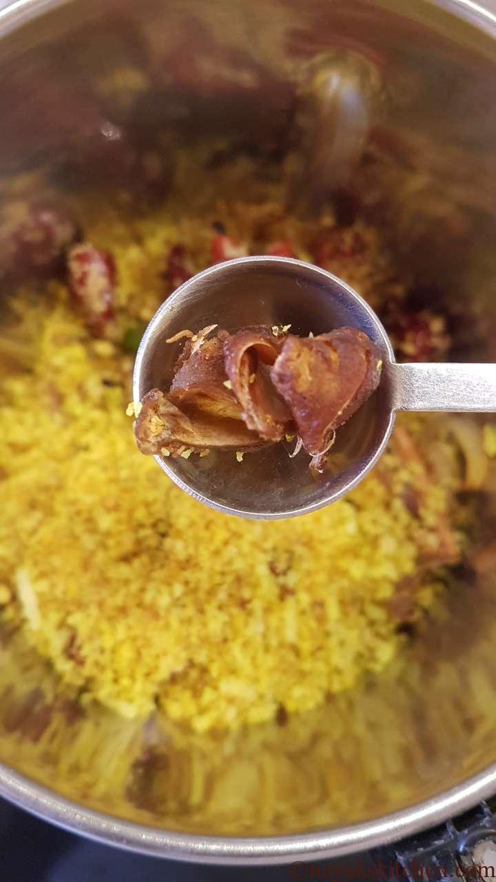 Adding tamarind to mixie jar