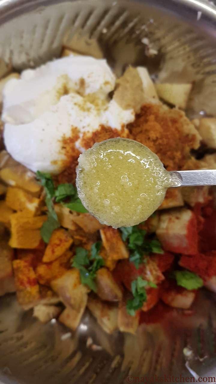Adding ghee to jackfruit pieces