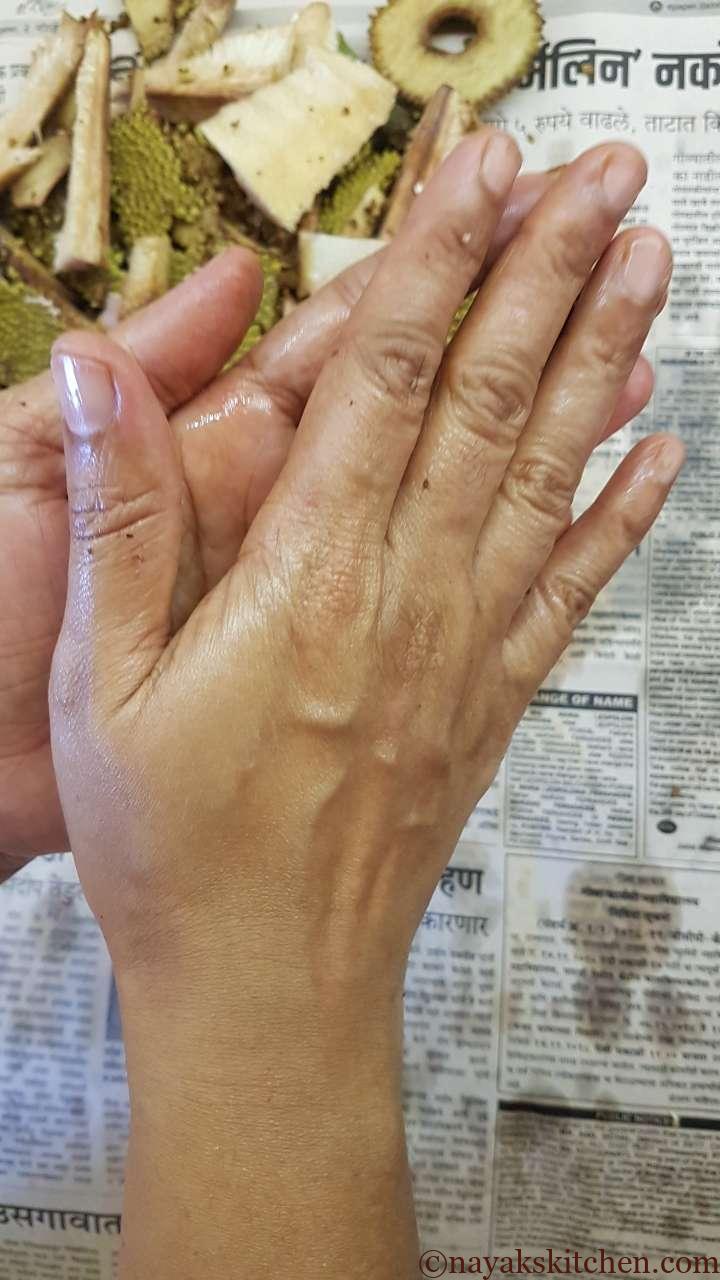 Rubbing oil to hands well