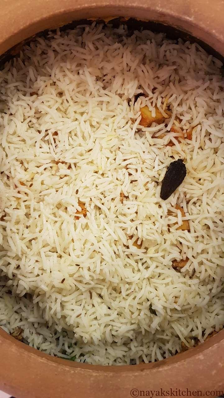 Adding last layer of basmati rice