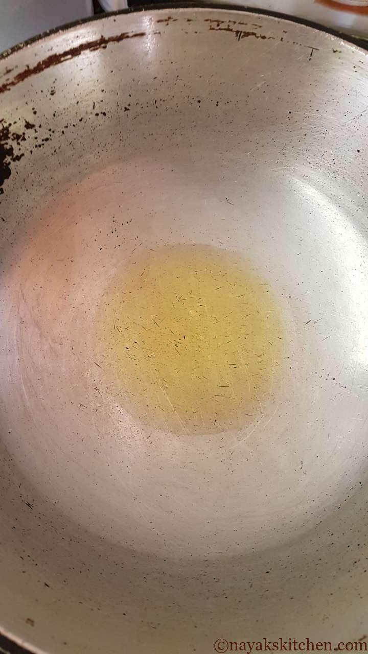 Heating oil for raw jackfruit recipe or Chaako