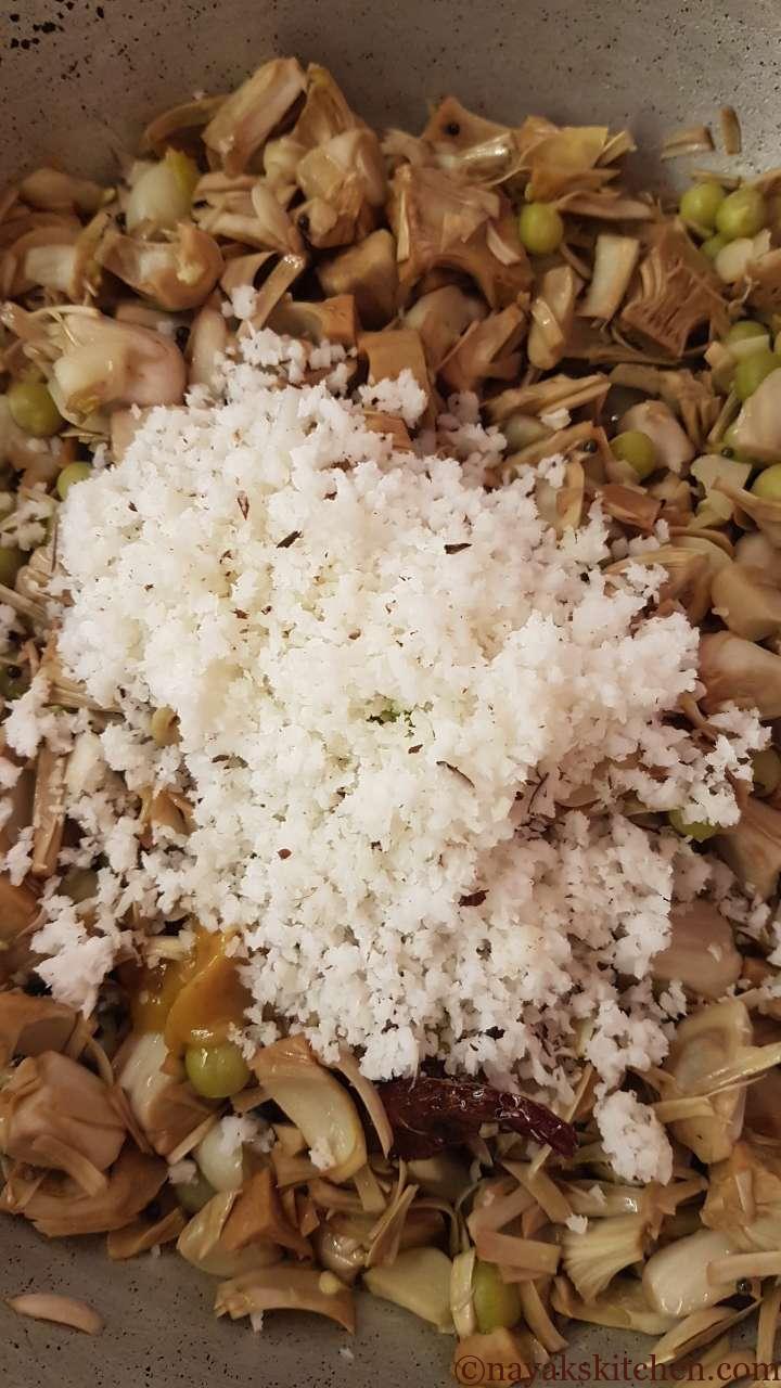 Adding grated coconut