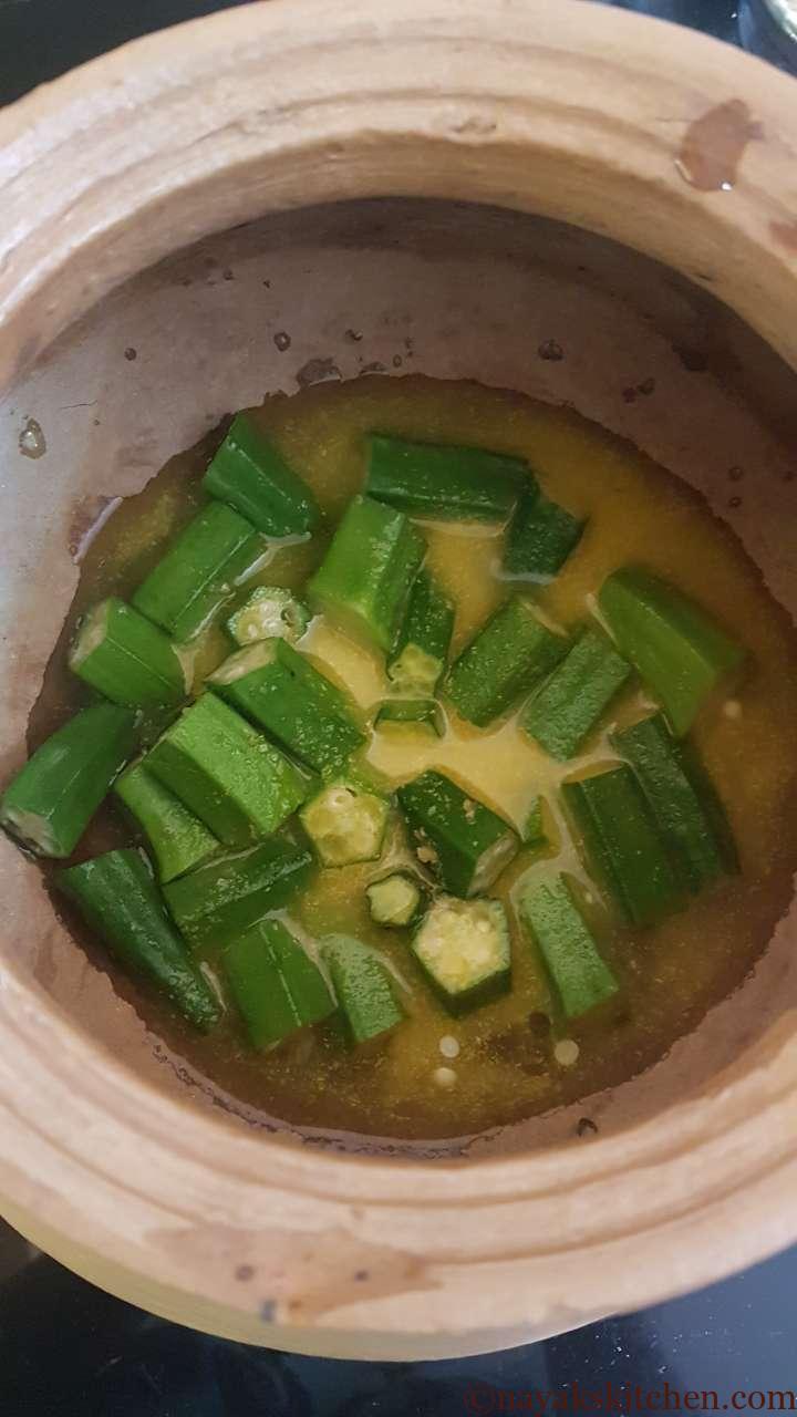 Adding water to cook ladies finger