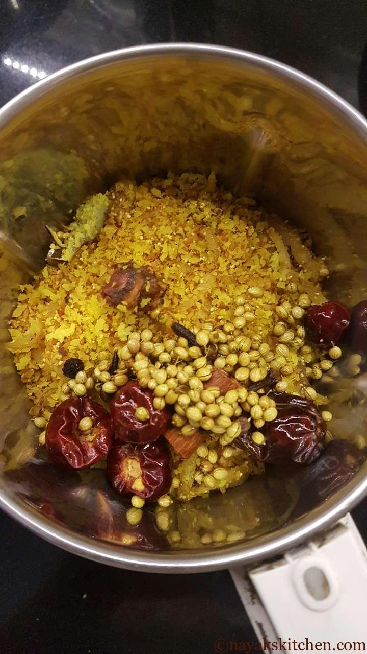 Roasted onion, coconut and spices in a mixie jar