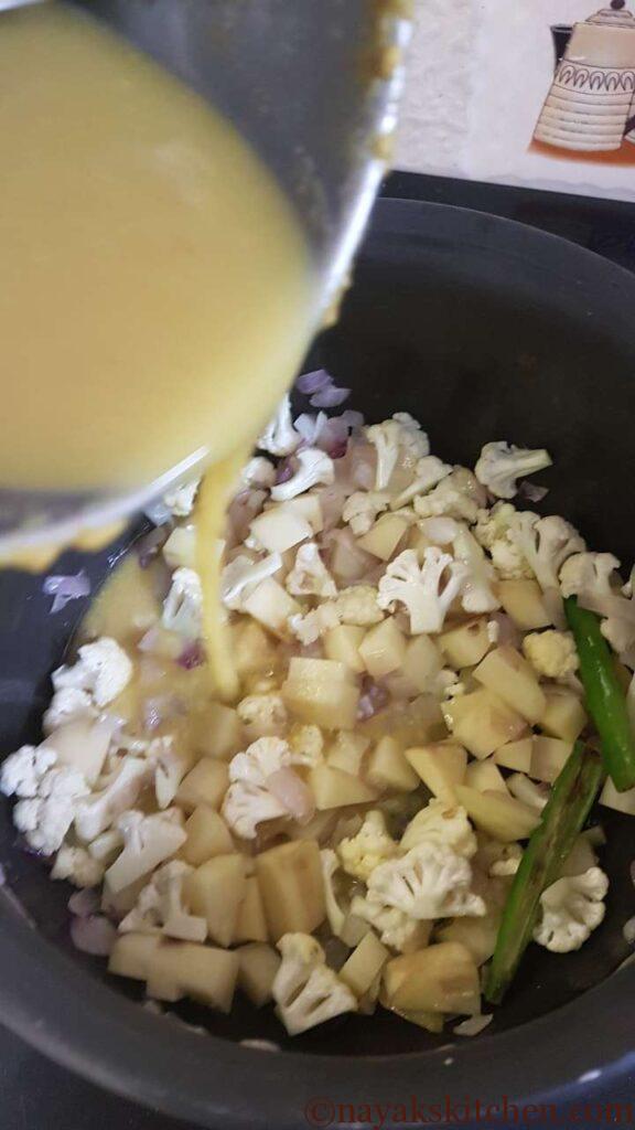 Add the water from the mixie to the vessel.