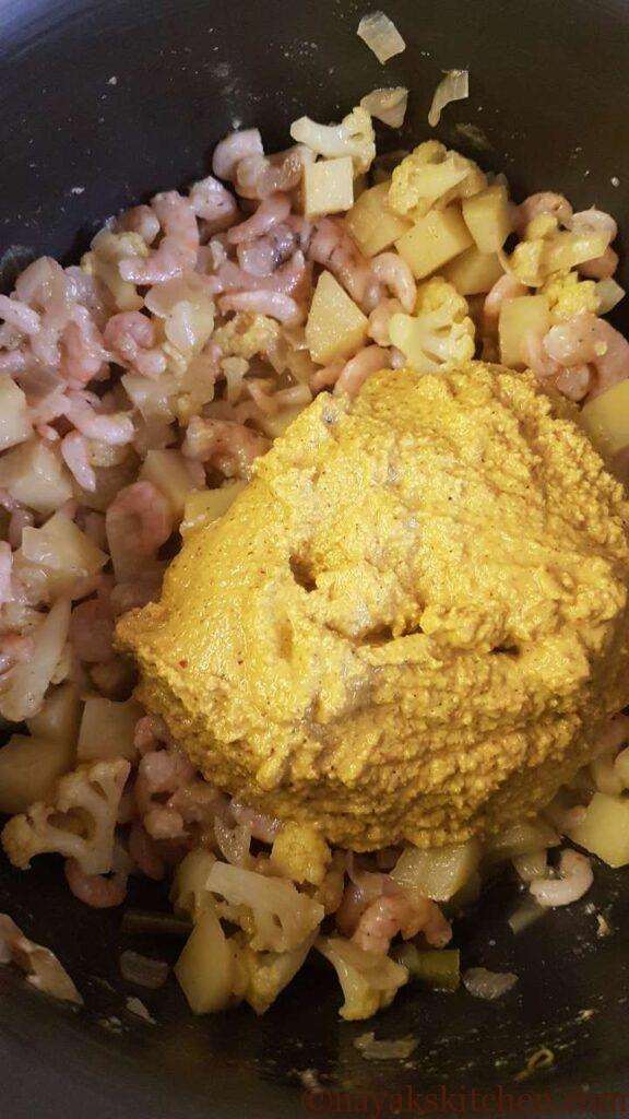 Add ground coconut-spice mixture