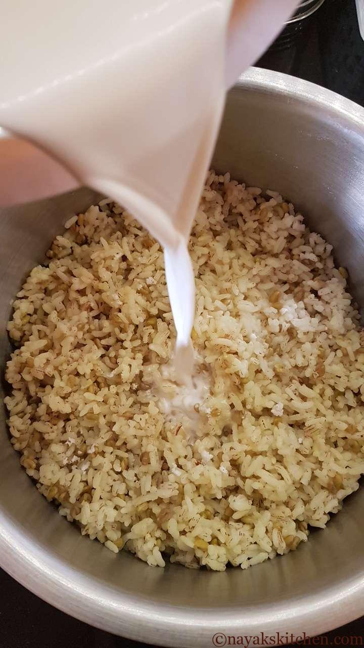 Adding coconut milk to rice and fenugreek