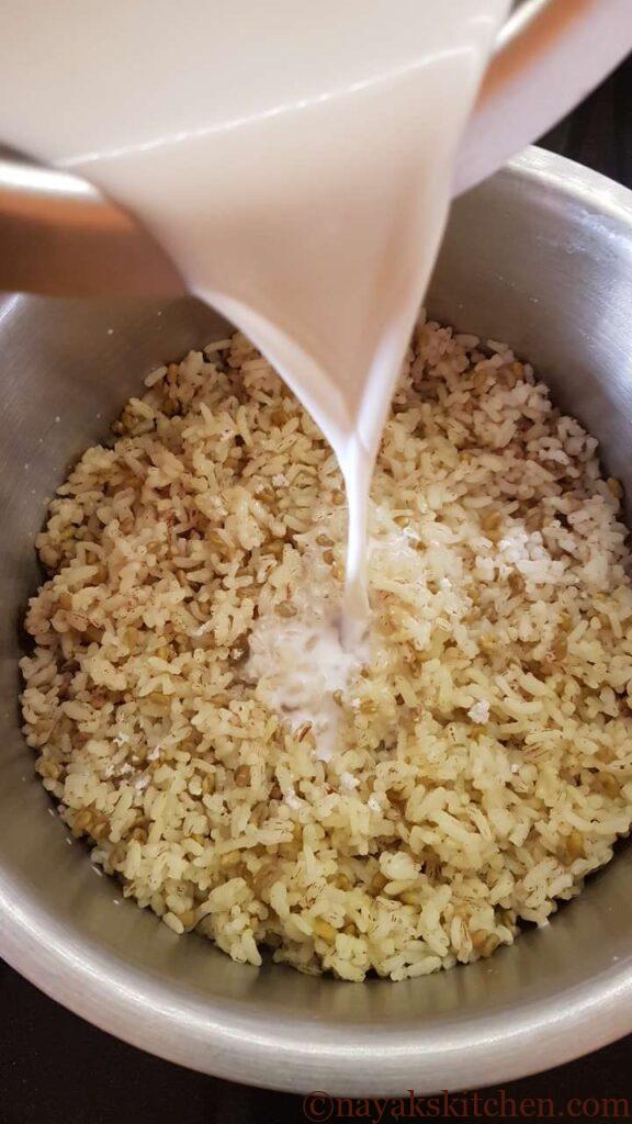 Adding coconut milk to rice and fenugreek