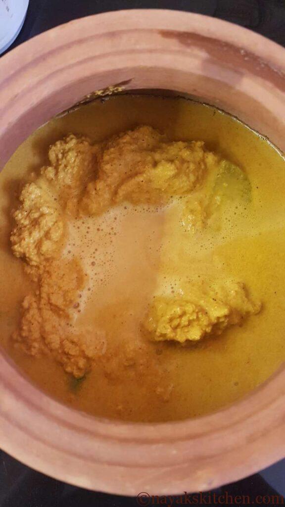 Adjusting consistency of shrimp curry