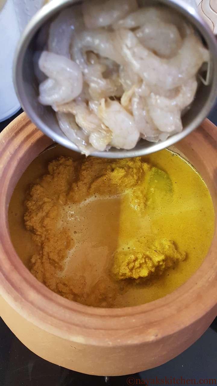 Adding prawns to spicy prawn curry