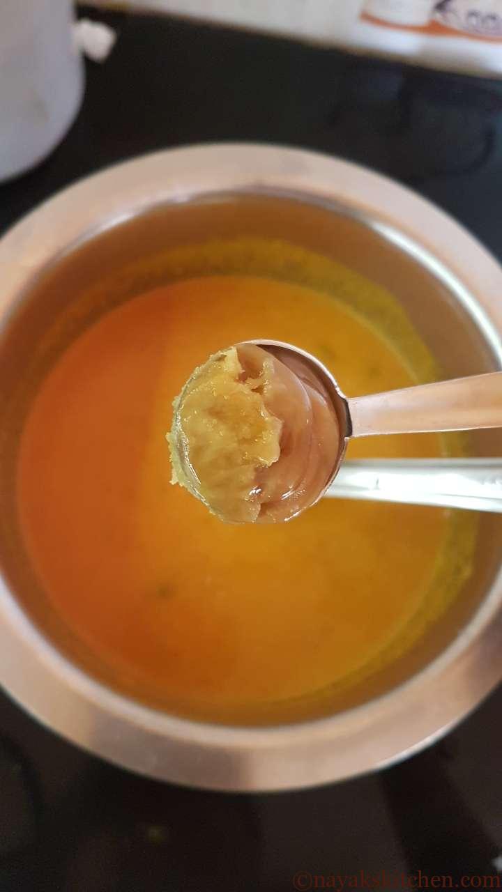 Adding jaggery to curry