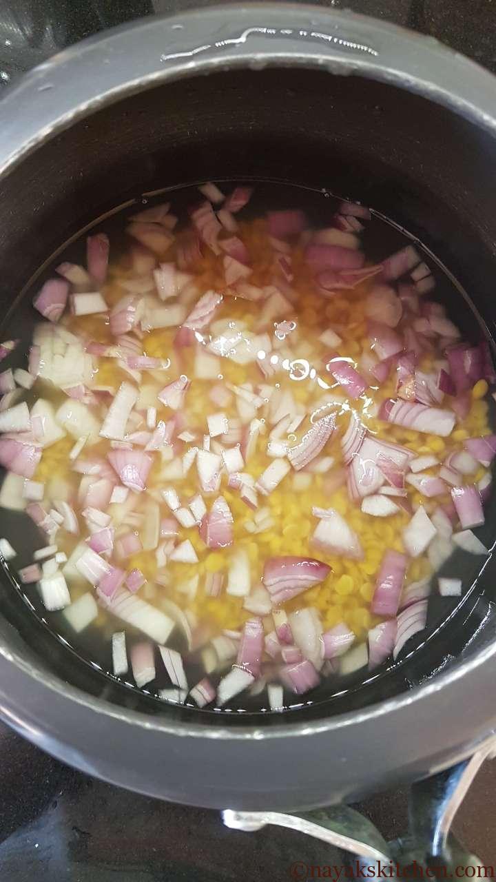 Cooking tur dal with onion